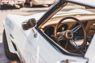 Vintage white car with tan interior